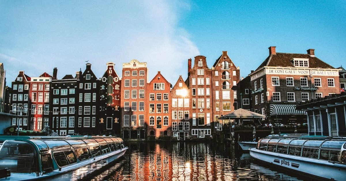 Colorful houses along the water in a European city