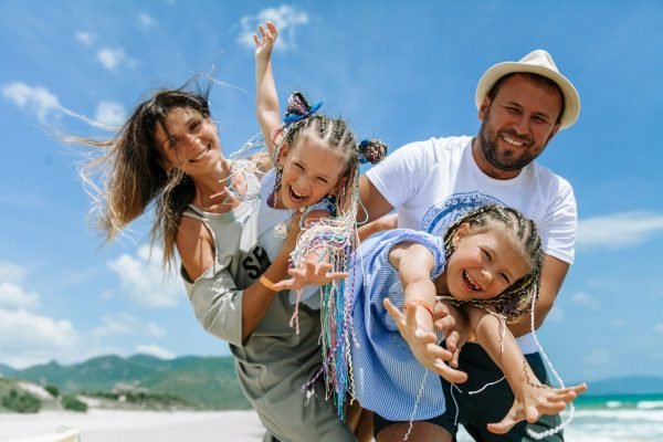 Happy family enjoying a sunny day in the city